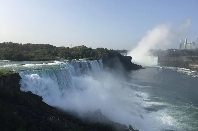 The American Falls by day seen from the Prospect Point side with the river beyond